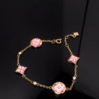 [Imperial] STAR AND SUN 4 MOTIF PINK MOP PINK GOLD BRACELET